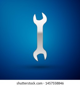 Silver Wrench icon isolated on blue background. Spanner repair tool. Service tool symbol.  Vector Illustration