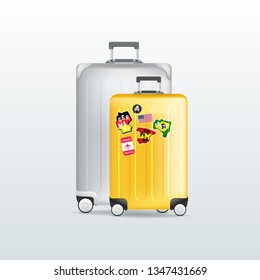 Silver and yellow travel luggage on white background. Realistic suitcase.