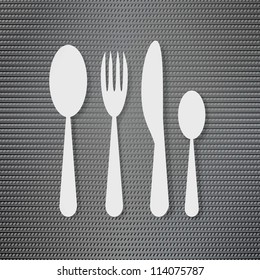 Silverware on the metal surface background