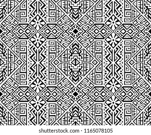 Simmetric seamless pattern in ethnic style. Tribal geometric ornament, perfect for textile design, site background, wrapping paper and other endless fill. Trendy boho tile.
