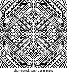 Simmetric seamless pattern in ethnic style. Tribal geometric ornament, perfect for textile design, site background, wrapping paper and other endless fill. Trendy boho tile.