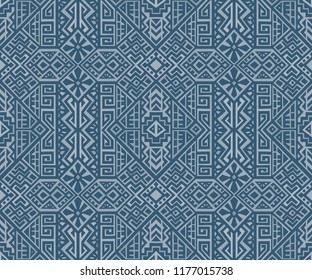 Simmetric seamless pattern in ethnic style. Tribal geometric ornament, perfect for textile design, site background, wrapping paper and other endless fill. Trendy boho tile.