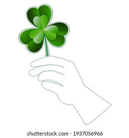 Simol of St. Patrick's Day. 3 leaf clover in the hand. Paper art vector illustration isolated on the white background. Template, banner, flyer, cover, greeting card. EPS10.
