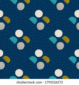 Simple abstract circle forms seamless pattern. Doodle ornament with navy blue dotted background and multicolor elements. Great for wallpaper, textile, wrapping paper, fabric print. Vector illustration