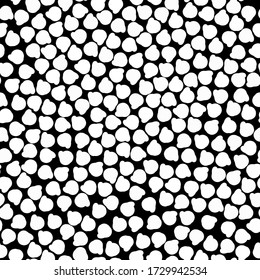 Simple abstract pattern. Black background, white spots, mosaic. The print is well suited for textiles, Wallpaper and packaging.