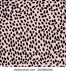 Simple abstract pattern. The black spots point . Pale pink background. Vector texture. Fashionable print for Wallpaper.