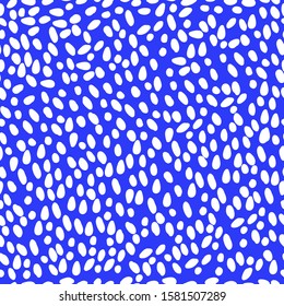 Simple abstract pattern. Bright blue background, white spots, snow. The print is well suited for textiles, banner, Wallpaper and packaging.