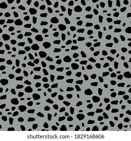 Simple abstract pattern. Small black spots. Gray background. Mosaic. Vector texture. Fashionable print for textiles and Wallpaper.