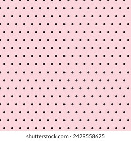 simple abstract seamlees black color small polka dot pattern on lite pink color background