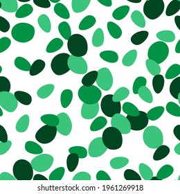 Simple abstract vector seamless pattern. Green dots shapes on a white background. For prints of fabric, textile products, packaging, stationery.