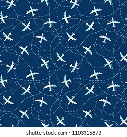 Simple aircraft in sky seamless background.