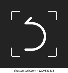 Simple arrow, backward. Linear, thin outline. White object in camera autofocus on dark background