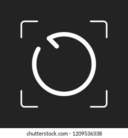 Simple arrow, update, reload, counterclockwise direction, backward. Navigation icon. Linear symbol with thin line. One line style. White object in camera autofocus on dark background