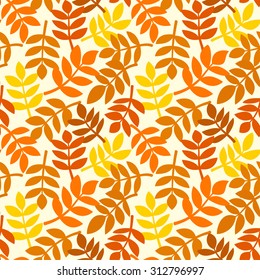 Simple background with leaves of autumn leaves plants randomly arranged, rowan branches in different shades of orange, vector seamless pattern