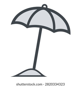 A simple beach umbrella stands alone on a sandy shore, evoking feelings of relaxation and solitude.