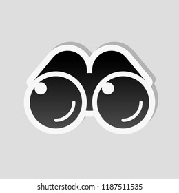 Simple binocular icon. Sticker style with white border and simple shadow on gray background