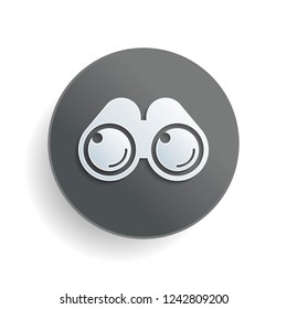 Simple binocular icon. White paper symbol on gray round button or badge with shadow