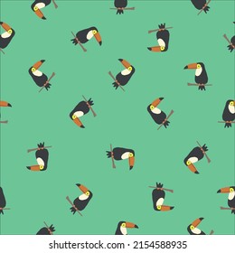 Simple bird pattern. small toucans. Green background. Fashionable print for textiles, wallpaper and packaging.