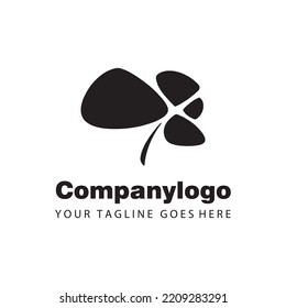 Sencillo trébol abstracto negro para la compañía del logotipo