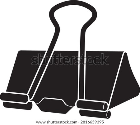 A simple black binder clip against a clean white backdrop perfect for concepts of holding together paperwork or business administration. Essential office tool.