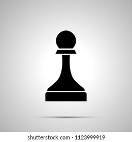 Simple black chess pawn icon with with shadow on gray