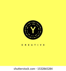 simple black circle vintage retro Y logo letter isolated on yellow background design concept
