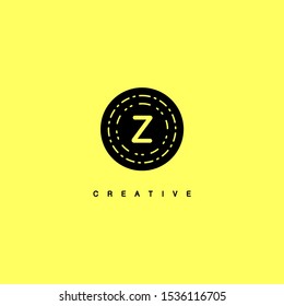 simple black circle vintage retro Z logo letter isolated on yellow background design concept