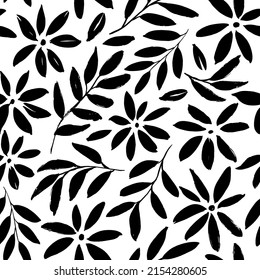 Simple black flowers hand drawn seamless pattern. Black brush flower vector silhouettes. Chamomile, daisy and chrysanthemum black silhouettes. Summer botanical background. Leaves and small branches