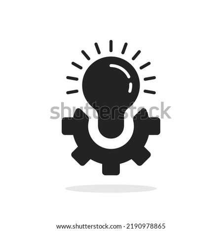 simple black gear wheel with lightbulb icon. flat trend modern cogwheel logotype design element isolated on white. concept of tech efficacy symbol or system pictogram or industry efficiency