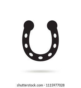 Simple black horseshoe vector icon isolated on white background. Horse shoe silhouette as international good luck symbol. Fortune and success sign