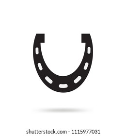 Simple black horseshoe vector icon isolated on white background. Horse shoe silhouette as international good luck symbol. Fortune and success sign