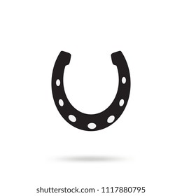 Simple black horseshoe vector icon isolated on white background. Horse shoe silhouette as international good luck symbol. Fortune and success sign