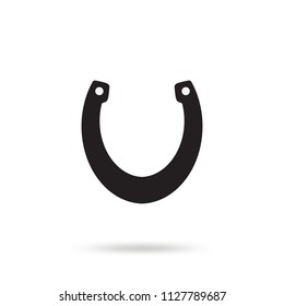 Simple black horseshoe vector icon isolated on white background. Horse shoe silhouette as international good luck symbol. Fortune and success sign