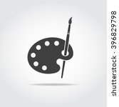Simple black icon of artist palette and brush.
