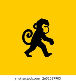 Simple black silhouette of a walking monkey on a yellow background