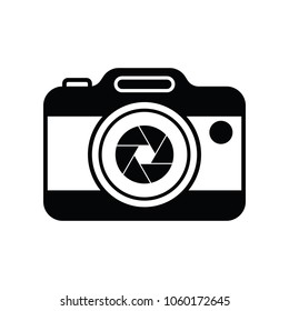 A simple black and white camera icon in vector format.