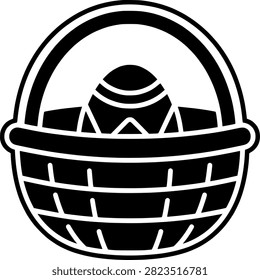 Simple black and white easter egg in woven basket