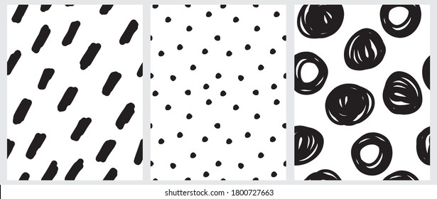 Simple Black and White Geometric Seamless Vector Patterns. Irregular Hand Drawn Doodle Print. Infantile Style Abstract Dotted Backdrop. Black Spots and Dots Isolated on a White Background.