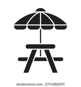 A simple black and white icon depicting a picnic table and umbrella