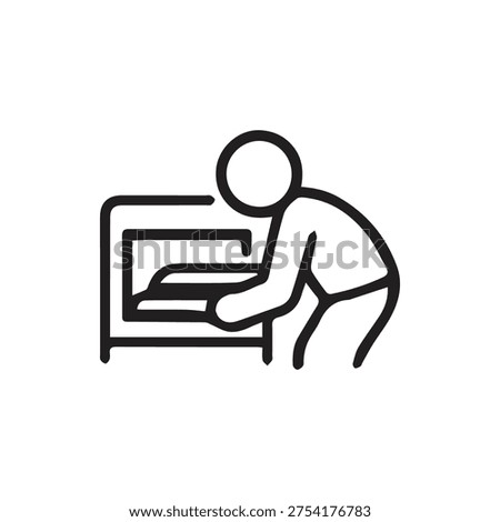 A simple black and white line icon showing a person bent over, operating an office machine like a printer or photocopier. Vector illustration.