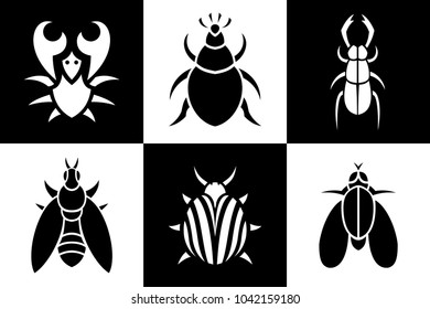Simple black and white silhouettes of insects and crab