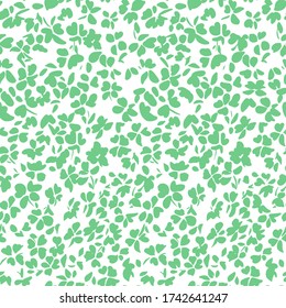 Simple botanical background. Nature ornament. Seamless pattern made of plain flower buds. Glade of small modest daisies. Trendy flat illustration. Fashion, textile and fabric application.