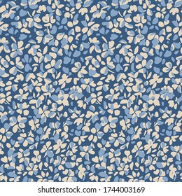 Simple botanical background. Nature ornament. Seamless pattern made of plain flower buds. Glade of small modest daisies. Trendy flat illustration. Fashion, textile and fabric application.
