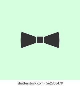 Simple Bow Tie icon flat. Grey vector symbol on green background