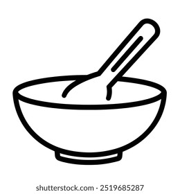 A simple bowl with a spoon, typically used for serving or eating food.