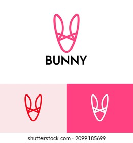 Simple bunny logo design concept. Outline rabbit company brand logomark illustration. Can representing fashion, beauty, love, woman.