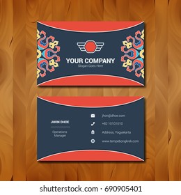 Simple Business card template design with company logo on wood background