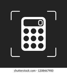 simple calculator icon. White object in camera autofocus on dark background