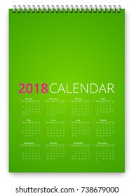 Simple calendar 2018 green colored template. Week starts from sunday. Vector realistic spiral notepad notebook