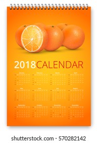 Simple calendar 2018 orange colored template. Week starts from sunday. Vector realistic spiral notepad notebook